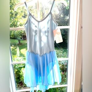 Natalie Dance Wear Adult Leotard sized “Petite” in powder blue. New With Tags